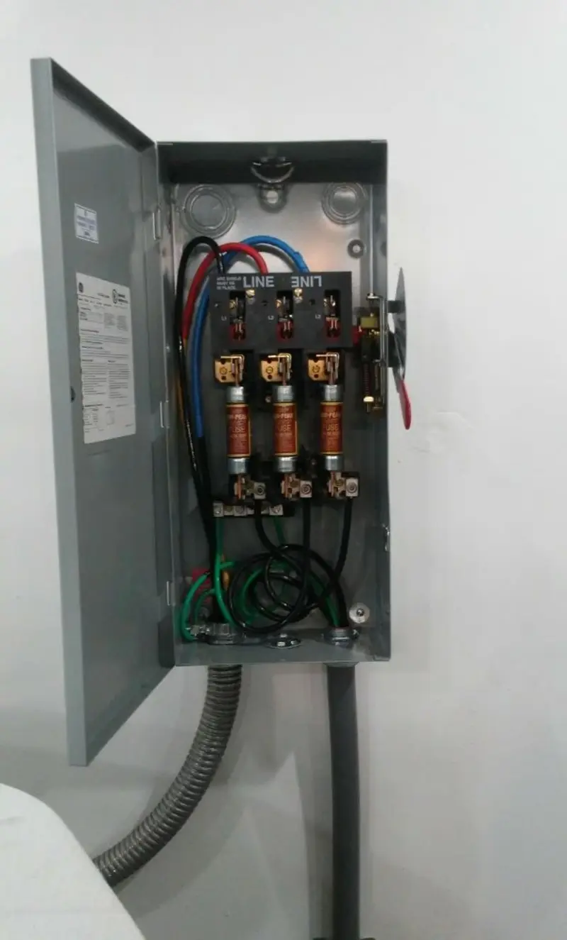 Three-phase disconnect switch installed for Smoke Detector Installation in D'Iberville